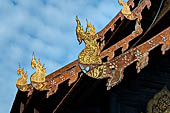 Chiang Mai - The Wat Phan Tao temple. Roof finals of the Wihan with the shape of stylished multi headed Naga.  